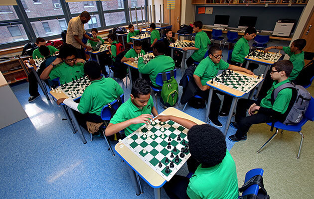 Kids playing chess
