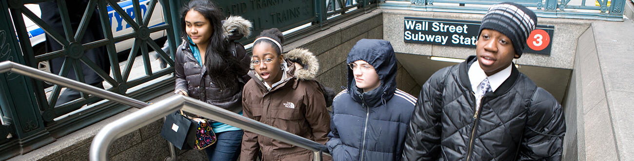 Students walking out of subway station