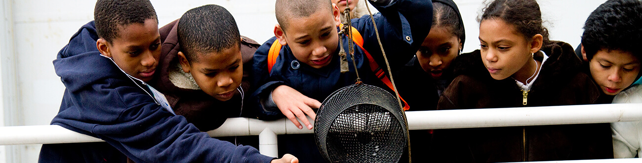 Kids on water ferry fishing